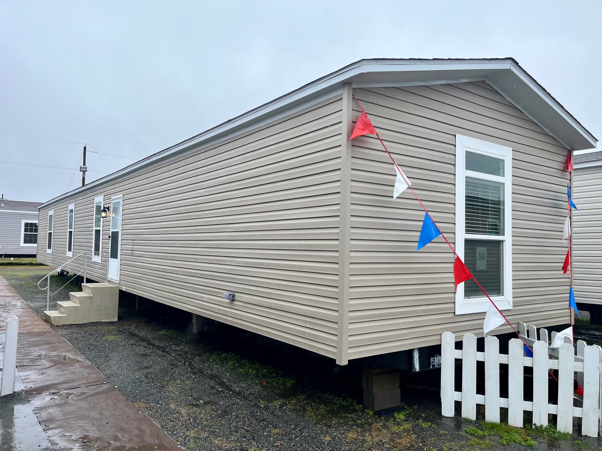 Model 14 Greg Tilley's Repos New Homes